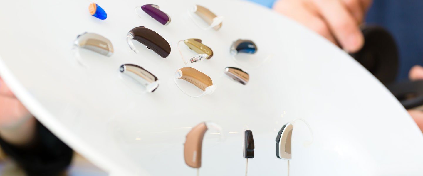 Display showing various types of over the counter hearing aids