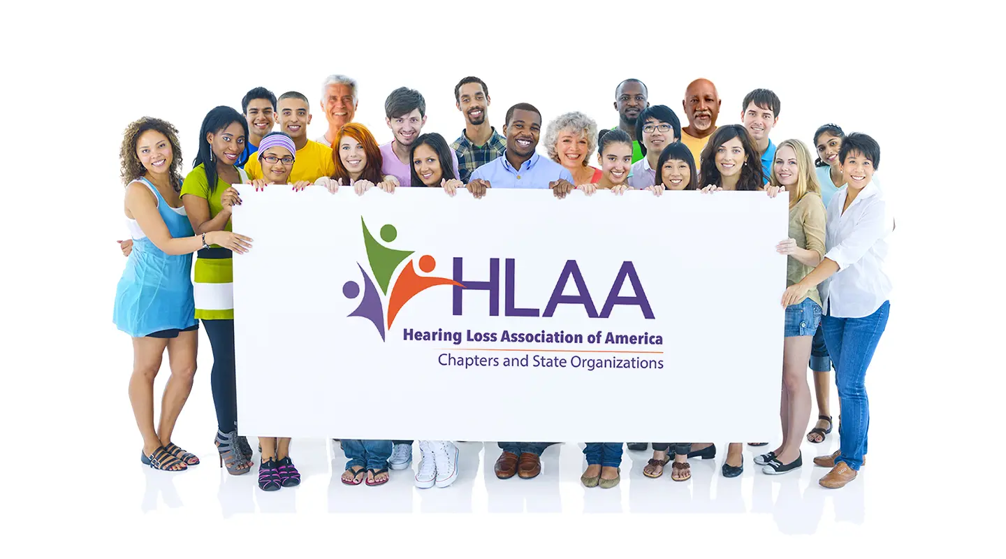 A group of people holding up an HLAA chapters and organizations banner