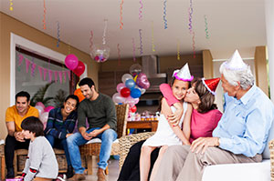 Group of people enjoying a party inside a house