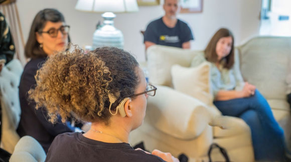 HLAA members share their experiences at a HOPE meeting