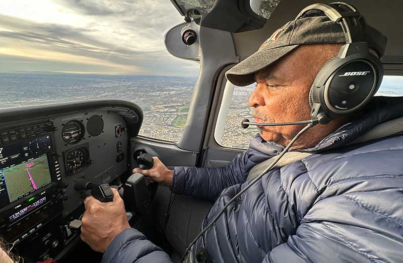 Veteran Melvin Allen in an airplane