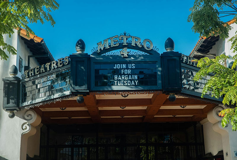Front view of a movie theater marquee sign