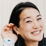 Michelle Hu headshot smiling into the camera
