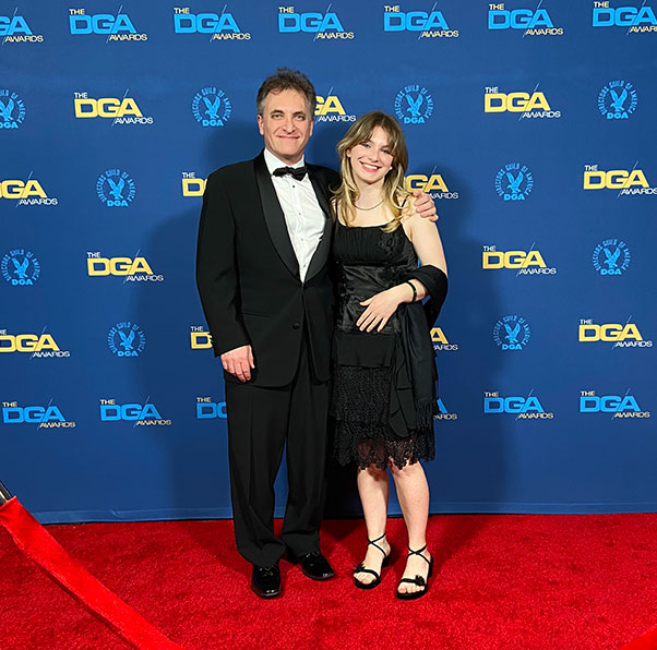 Larry Guterman and daughter at red carpet